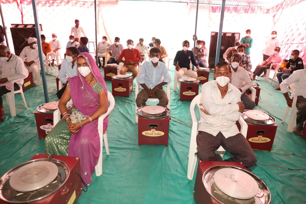 Shri Amit Shah at a function to distribute 100 electric potter wheels